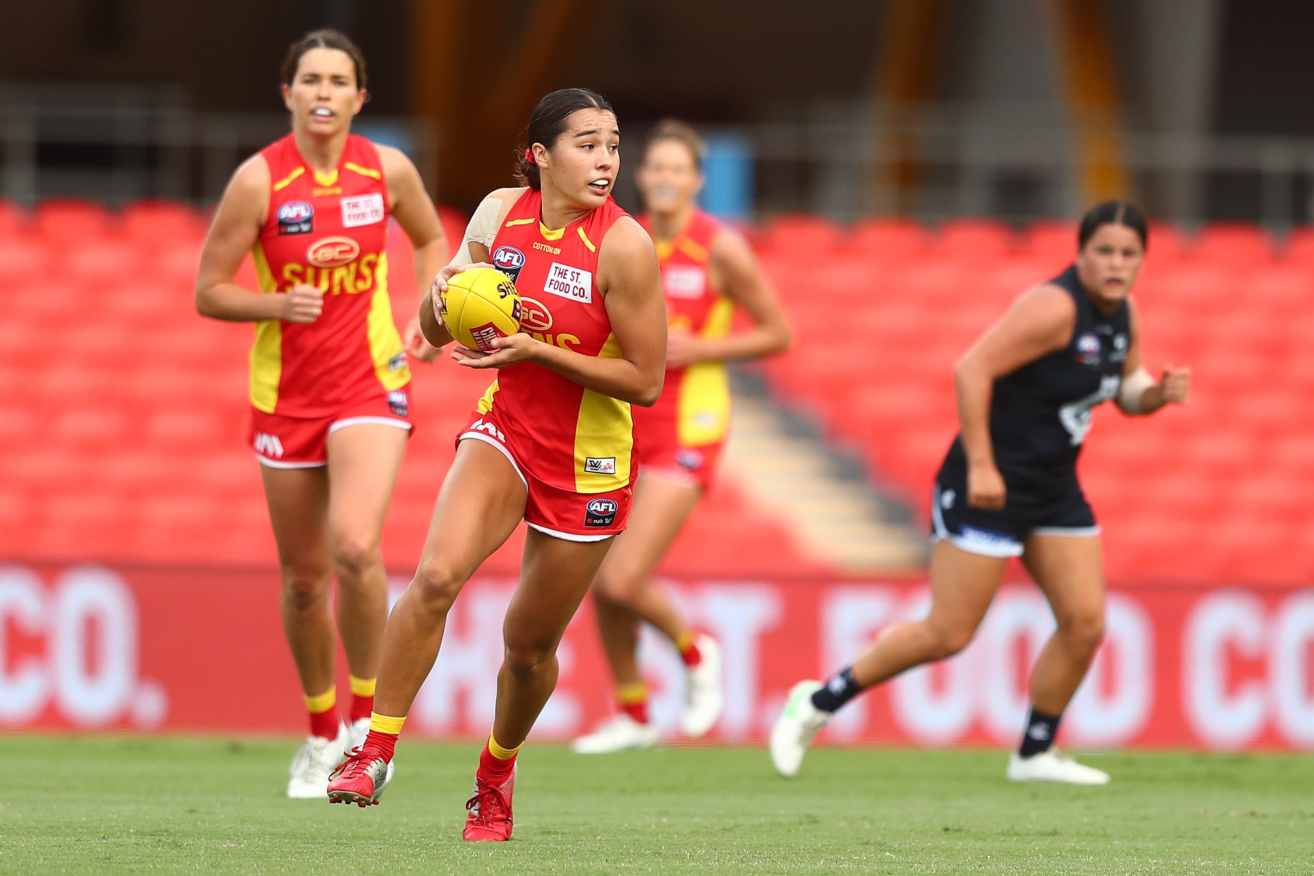 Match Report A seasoned Carlton outfit defeat the SUNS at Metricon Stadium